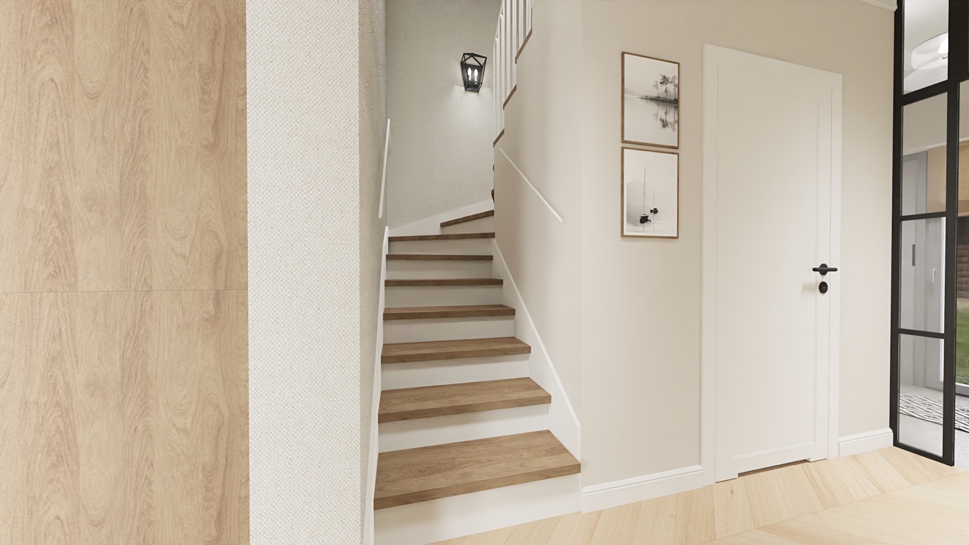Klatka schodowa w jasnej tonacji z drewnianymi stopniami i białymi ścianami, oświetlona nowoczesnym kinkietem, z widocznymi obrazami na ścianie i przeszklonymi drzwiami.