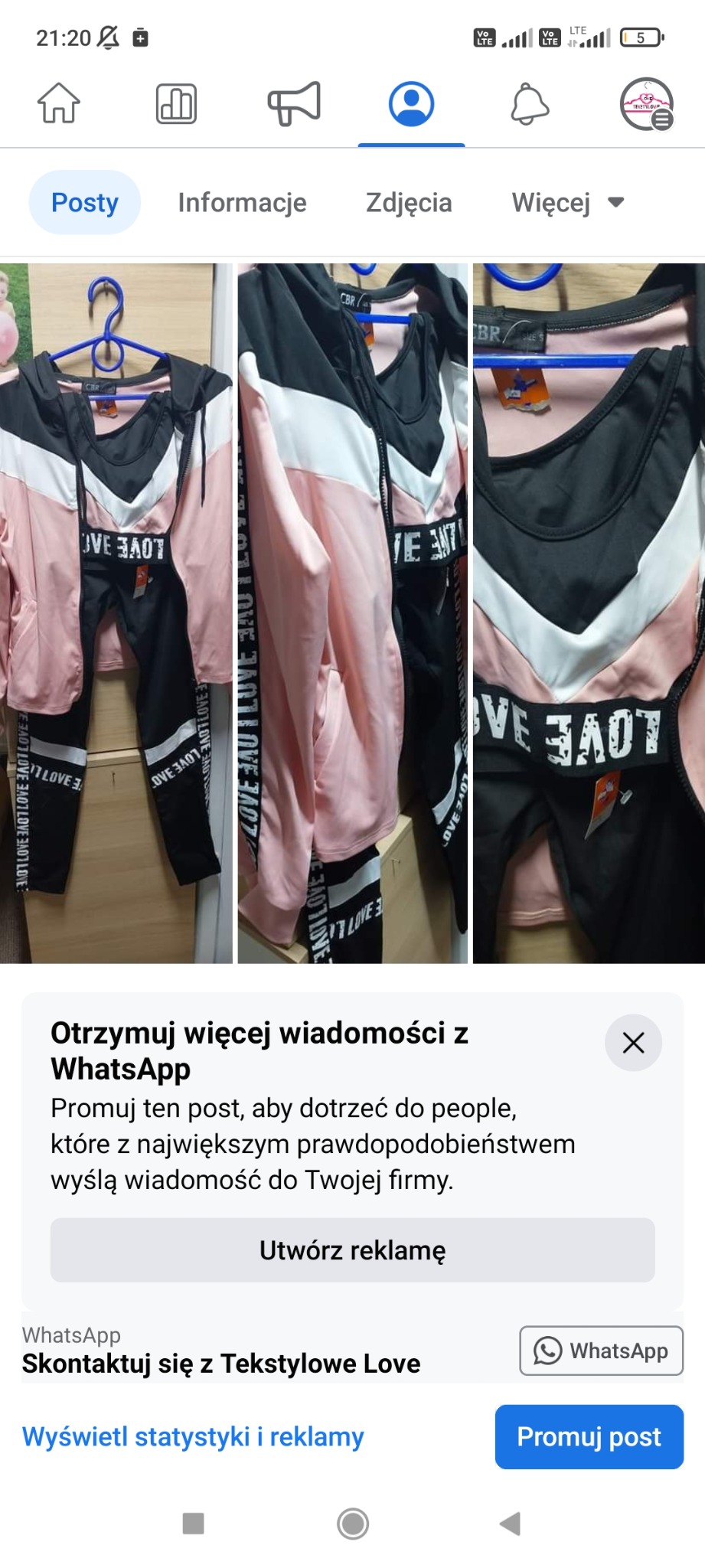 Komplet dresowy damski: bluza z kapturem w kolorach różowym, białym i czarnym oraz czarne spodnie z napisem 'LOVE' po bokach, wiszący na wieszaku.