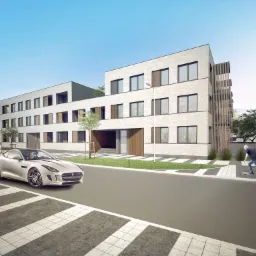 Wizualizacja budynku usługowego z jasnej cegły z drewnianymi elementami, przed budynkiem sportowy samochód i mężczyzna na deskorolce.