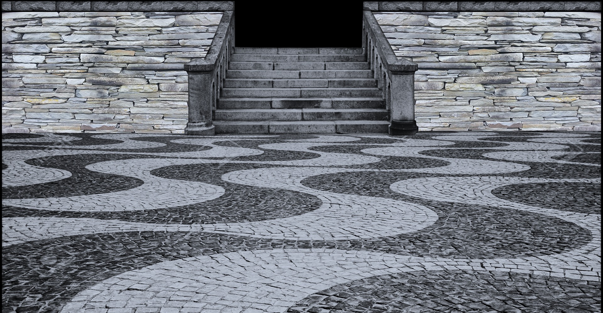 Czarno-białe zdjęcie wzorzystego bruku ułożonego w falujące pasy, prowadzącego do kamiennych schodów z balustradami i ściany z kamienia łupanego.