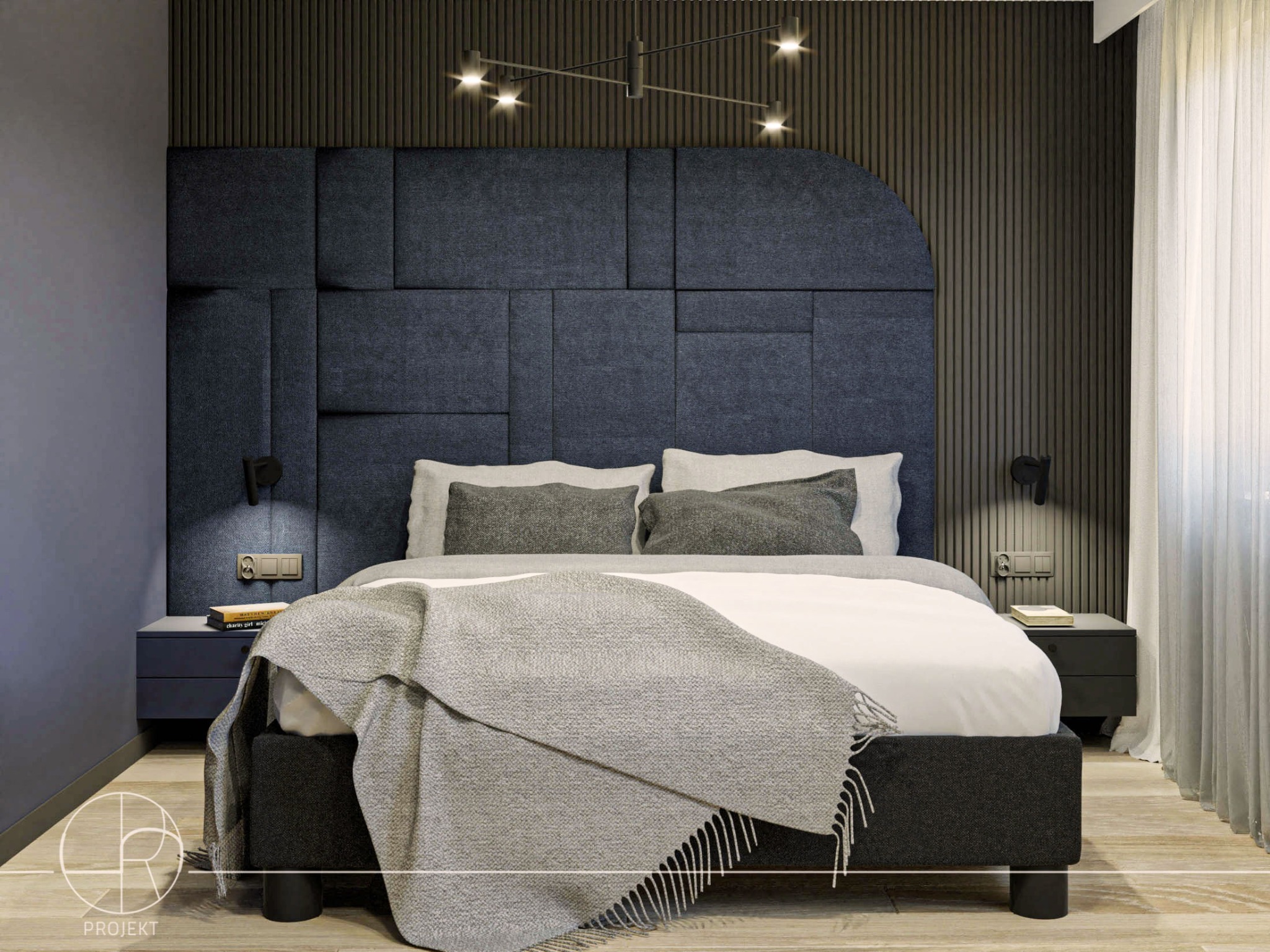 Nowoczesna sypialnia z tapicerowanym, modułowym zagłówkiem w odcieniach granatu, minimalistyczną lampą sufitową i drewnianą boazerią ścienną, uzupełniona o szarą narzutę z frędzlami.