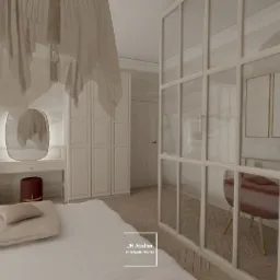 Jasna sypialnia z baldachimem, toaletką z podświetlanym lustrem i szklaną ścianką działową w stylu loftowym oddzielającą przestrzeń do pracy.