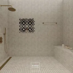 Minimalistyczna kabina prysznicowa wyłożona drobną, kwadratową mozaiką w odcieniach beżu, z złotymi elementami armatury i odpływem liniowym oraz wnęką z czarno-białym wzorem geometrycznym.