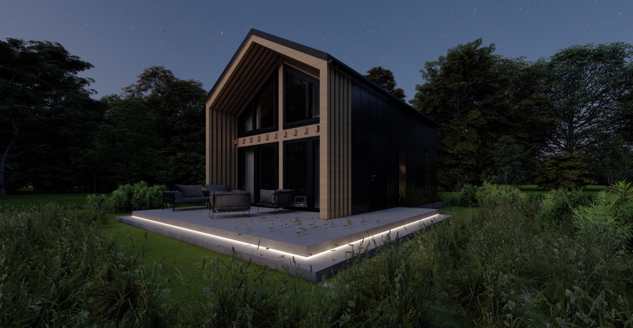 Nowoczesny, czarno-drewniany dom z dużymi oknami, oświetlony listwami LED wzdłuż tarasu, otoczony zielenią i drzewami pod wieczornym, gwiaździstym niebem.
