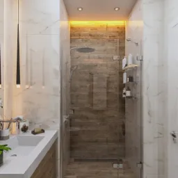 Nowoczesna łazienka z kabiną prysznicową wyłożoną drewnopodobnymi płytkami, białą umywalką nablatową na szafce z drewnianym fornirem, marmurowe płytki na ścianach i podłodze, oraz wisząca lampa...