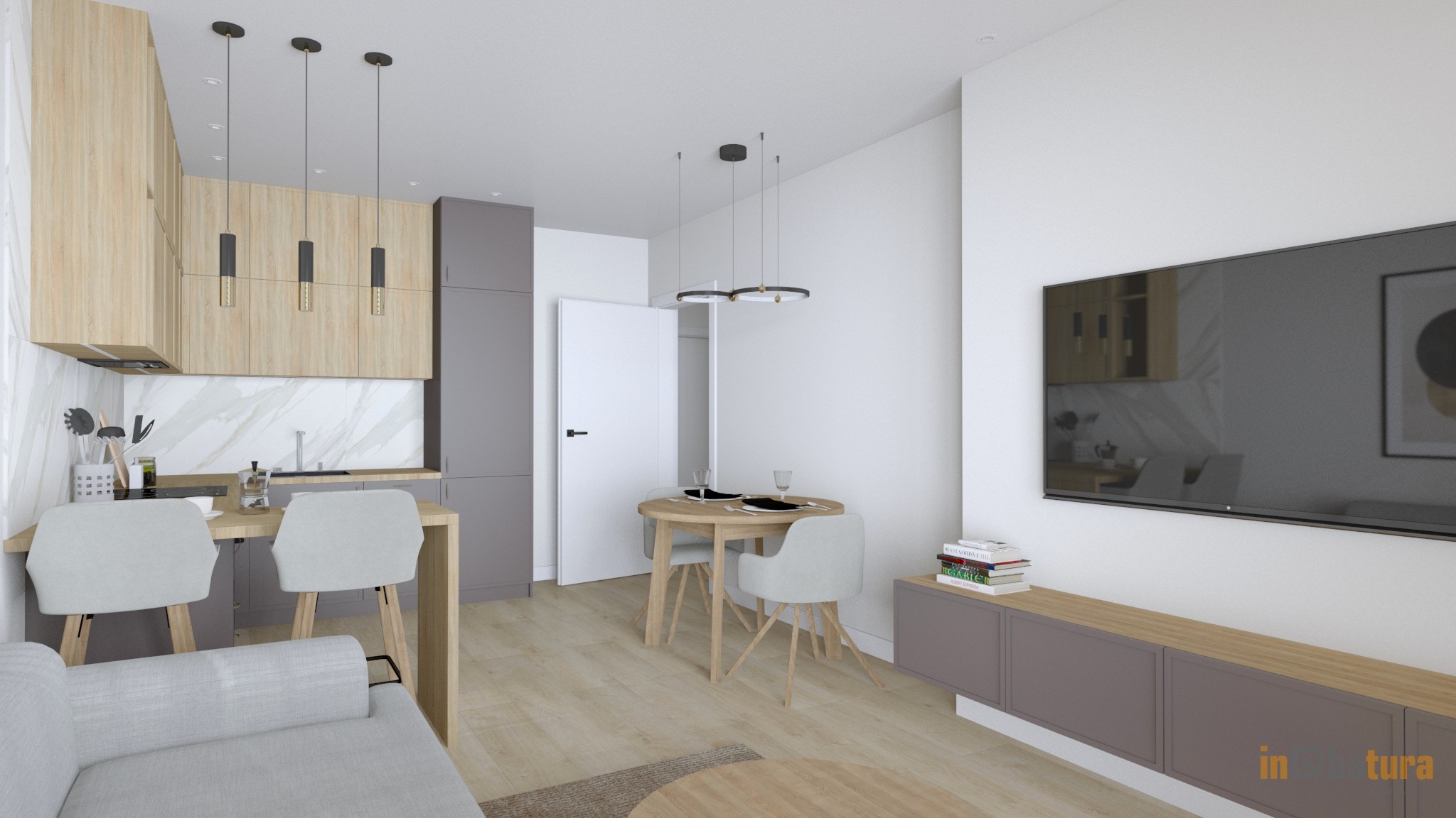 Wnętrze małego mieszkania z aneksem kuchennym, okrągłym stołem jadalnym i szarą sofą, oświetlone wiszącymi lampami z czarnymi elementami, minimalistyczny design.