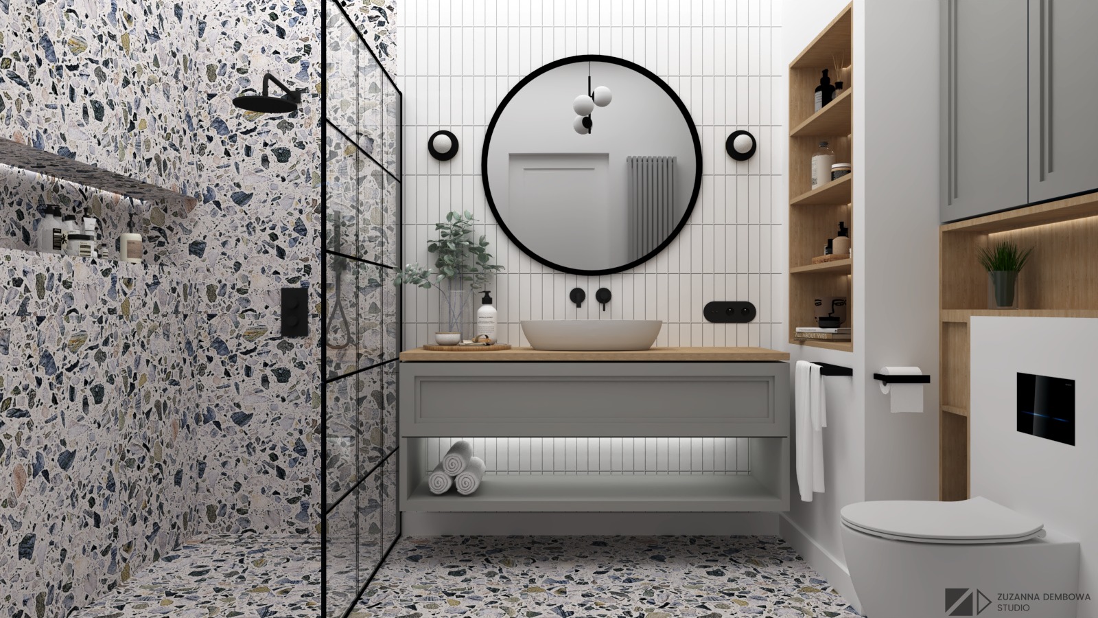 Nowoczesna łazienka z prysznicem typu walk-in wykończona płytkami lastryko, okrągłe lustro nad umywalką nablatową, oświetlenie LED pod szafką i wisząca toaleta.