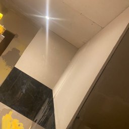 Ułożenie płytek 60/60 plus wyrównanie płytą kg . 