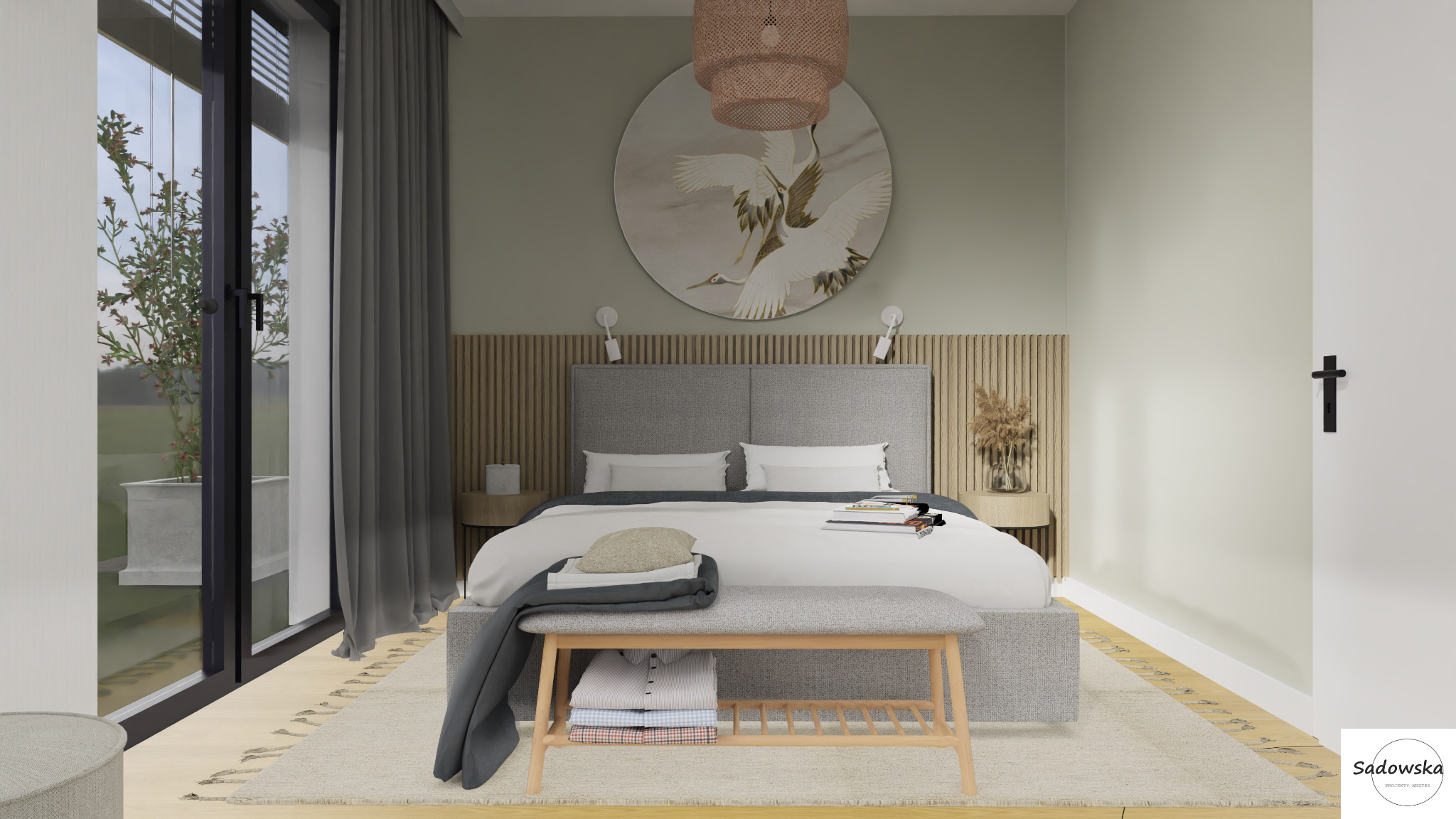 Jasna sypialnia w stylu skandynawskim z łóżkiem, drewnianym panelem za wezgłowiem, okrągłym obrazem z motywem żurawi, lampą z wikliny i ławką z ubraniami u stóp łóżka.