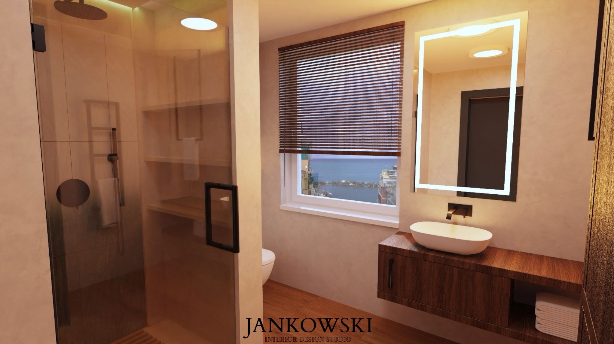 Nowoczesna łazienka z kabiną prysznicową typu walk-in, umywalką na szafce z drewna i podświetlanym lustrem. W tle widok z okna na morze.