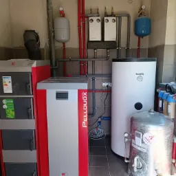 Realizacja kotłowni na pellet i drewno wraz z kompleksowym wykonaniem przyłącza wody użytkowej do budynku