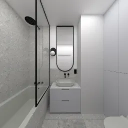 Minimalistyczna aranżacja łazienki w Płocku: szare płytki lastryko, wanna z czarnym parawanem, owalna umywalka nablatowa na szarej szafce i podłużne lustro w czarnej ramie.