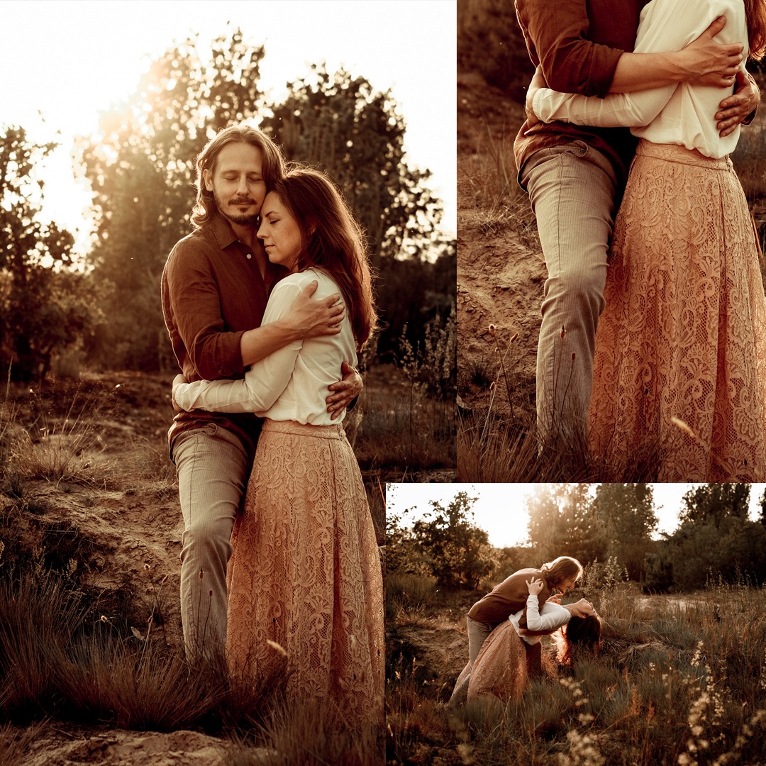 Ujęcie zakochanej pary w objęciach na tle zachodzącego słońca, w ciepłych barwach. Kobieta w koronkowej spódnicy, mężczyzna w brązowej koszuli. Romantyczna sesja w plenerze.