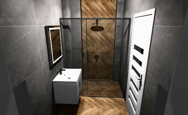 Nowoczesna łazienka z kabiną prysznicową wyłożoną drewnopodobnymi płytkami w jodełkę, umywalką na szafce i podświetlanym lustrem na szarej ścianie z płytek.