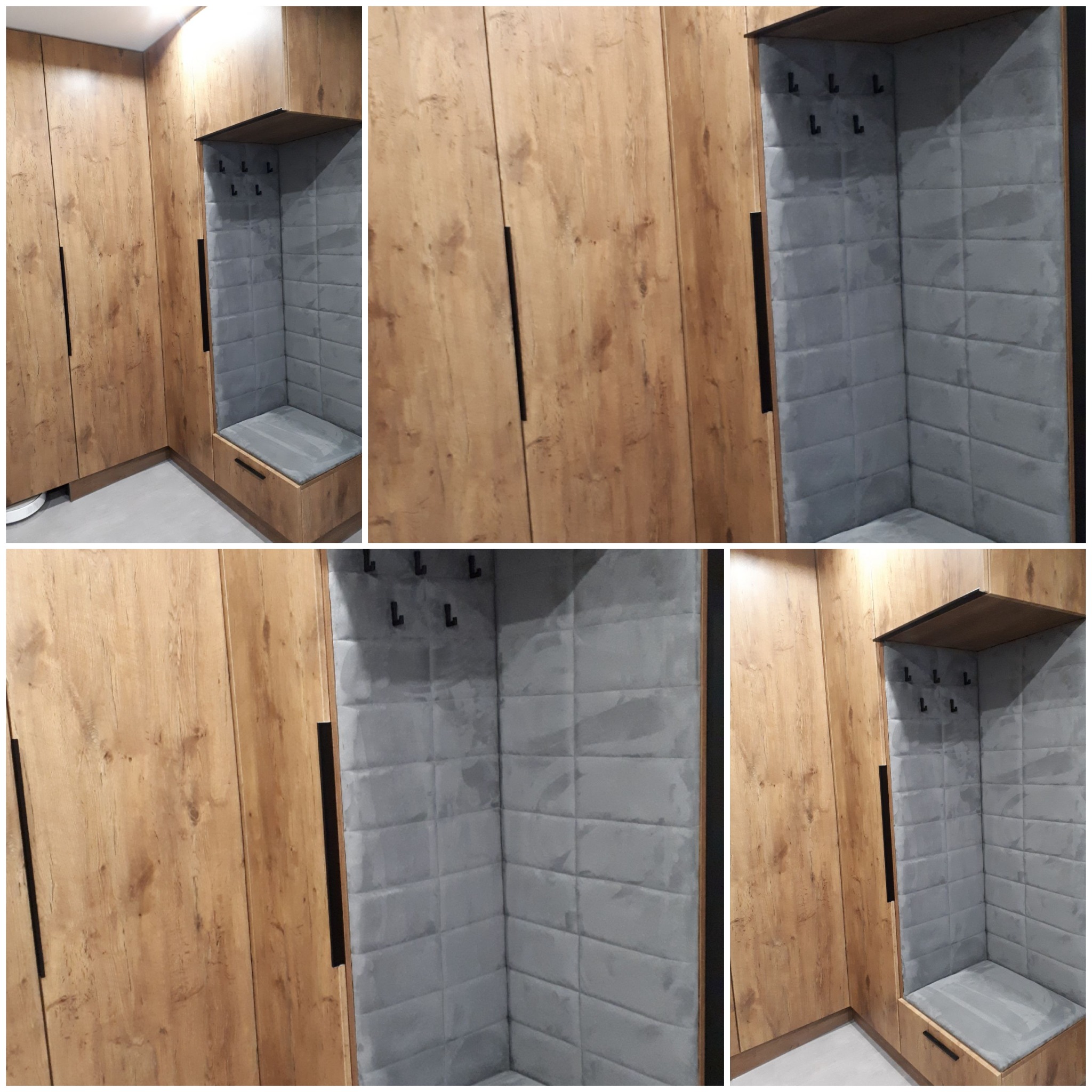 Drewniana zabudowa wnęki z szarą tapicerowaną ścianą i siedziskiem, czarne haczyki na ubrania, minimalistyczne uchwyty