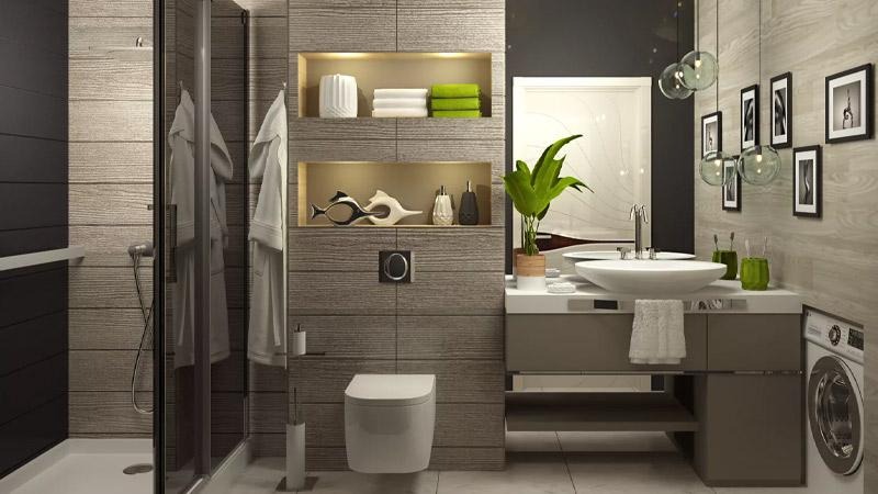 Nowoczesna łazienka z kabiną prysznicową, umywalką nablatową, toaletą podwieszaną i pralką, wykończona płytkami imitującymi drewno, z dekoracyjnymi niszami i oświetleniem punktowym.