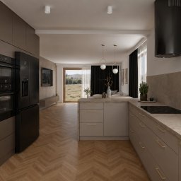 Avles Studio - Nowoczesna kuchnia z zabudową w kolorze taupe, czarnymi sprzętami Electrolux i złotymi uchwytami. Otwarta na salon z drewnianą podłogą w jodełkę i widokiem na zieleń.