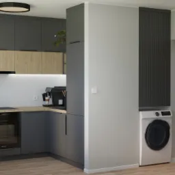 Wizualizacja nowoczesnej kuchni z szarymi szafkami, drewnianymi akcentami i białymi heksagonalnymi płytkami na ścianie, z pralką w zabudowie obok wejścia do łazienki z wzorzystą podłogą.