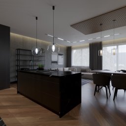 YUSH Studio Projektowania Wnętrz - Nowoczesna aranżacja wnętrza w Puławach: czarna wyspa kuchenna z marmurowym blatem, drewniana podłoga w jodełkę, designerskie lampy i regał. Minimalizm i elegancja.