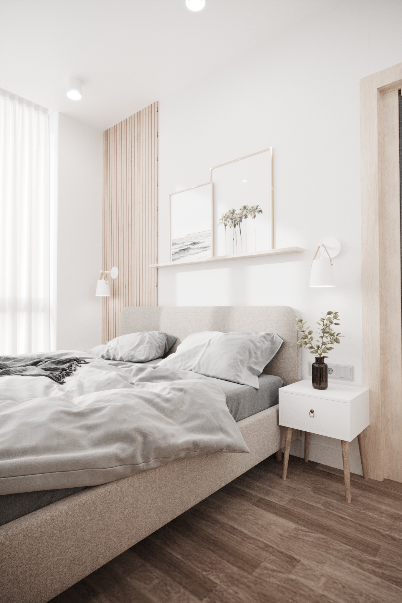 Jasna sypialnia z łóżkiem typu king-size, minimalistyczną szafką nocną i dekoracyjnymi obrazami na ścianie, oświetlona lampami ściennymi.