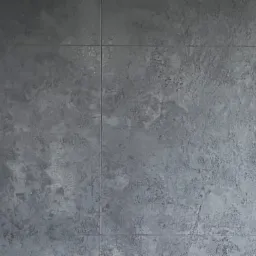 Szara ściana wykończona płytkami imitującymi beton w Łańcucie, widoczne fugi i struktura powierzchni.