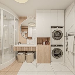 Adam Jasek Design Studio - Nowoczesna łazienka z kabiną prysznicową, okrągłym lustrem, umywalką z szafką z lamelami, pralką i suszarką w zabudowie oraz koszami na pranie.