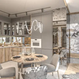 Nowoczesna kuchnia z drewnianymi frontami, okrągłym stołem i designerską lampą LED w kształcie abstrakcyjnej linii, odbijająca się w lustrzanej ścianie.