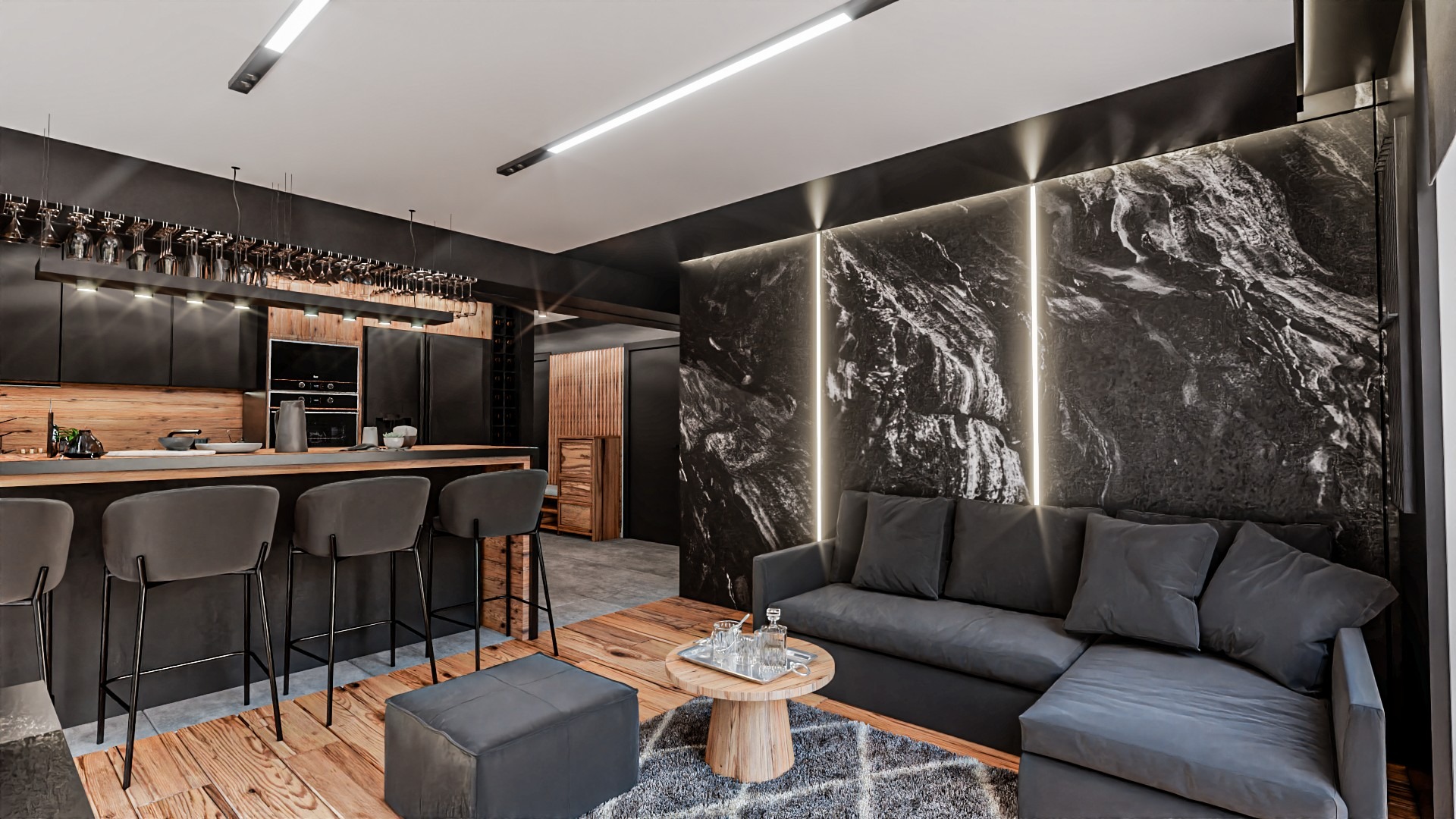 Ciemne wnętrze mieszkania z otwartą kuchnią, wyspą barową z hokerami, szarą sofą i ścianą imitującą marmur z podświetleniem LED.