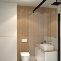 Wizualizacja łazienki z kabiną prysznicową typu walk-in, umywalką nablatową, toaletą podwieszaną i grzejnikiem drabinkowym w czarnym kolorze na tle płytek imitujących beton.