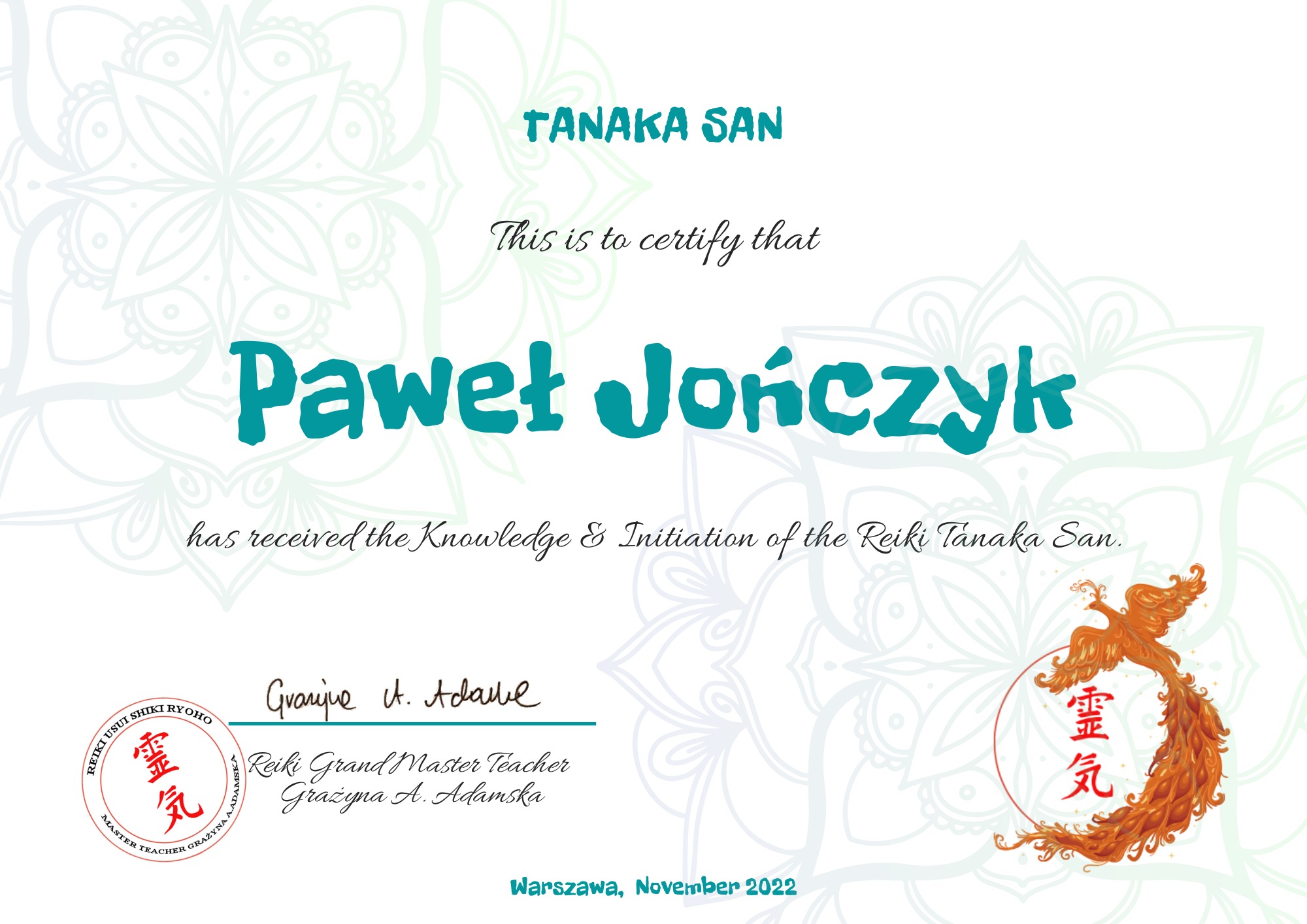 Certyfikat Reiki Tanaka San dla Pawła Jończyka, podpisany przez Reiki Grand Master Teacher Grażynę A. Adamską, z motywem feniksa i mandali w tle, wydany w Warszawie w listopadzie 2022.