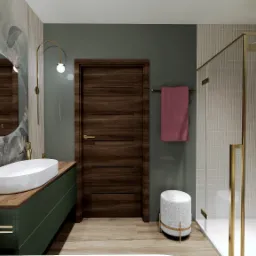 Nowoczesna łazienka z okrągłym lustrem podświetlanym LED, zieloną szafką pod umywalką i złotymi akcentami, w tym kabina prysznicowa.