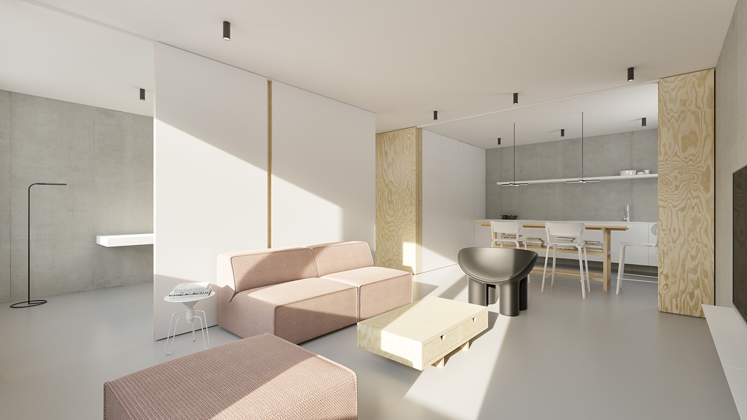 Jasne, minimalistyczne wnętrze mieszkania z sofą w odcieniach różu, drewnianymi akcentami i otwartą kuchnią w tle, oświetlone naturalnym światłem wpadającym przez okno.