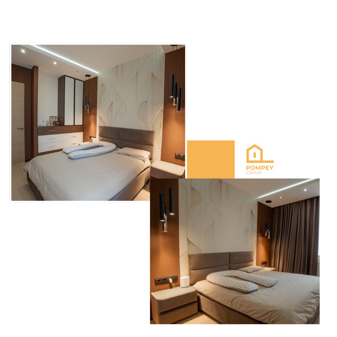 Nowoczesna sypialnia z beżowym łóżkiem, wzorzystą tapetą i wiszącymi lampami. Widoczne szafki nocne i zabudowa garderoby z oświetleniem LED.