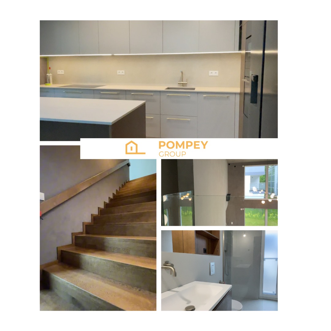 Nowoczesna kuchnia z oświetleniem LED, schody z drewnianymi stopniami, minimalistyczna łazienka z umywalką nablatową i kabiną prysznicową. Prezentacja realizacji Pompey Group.