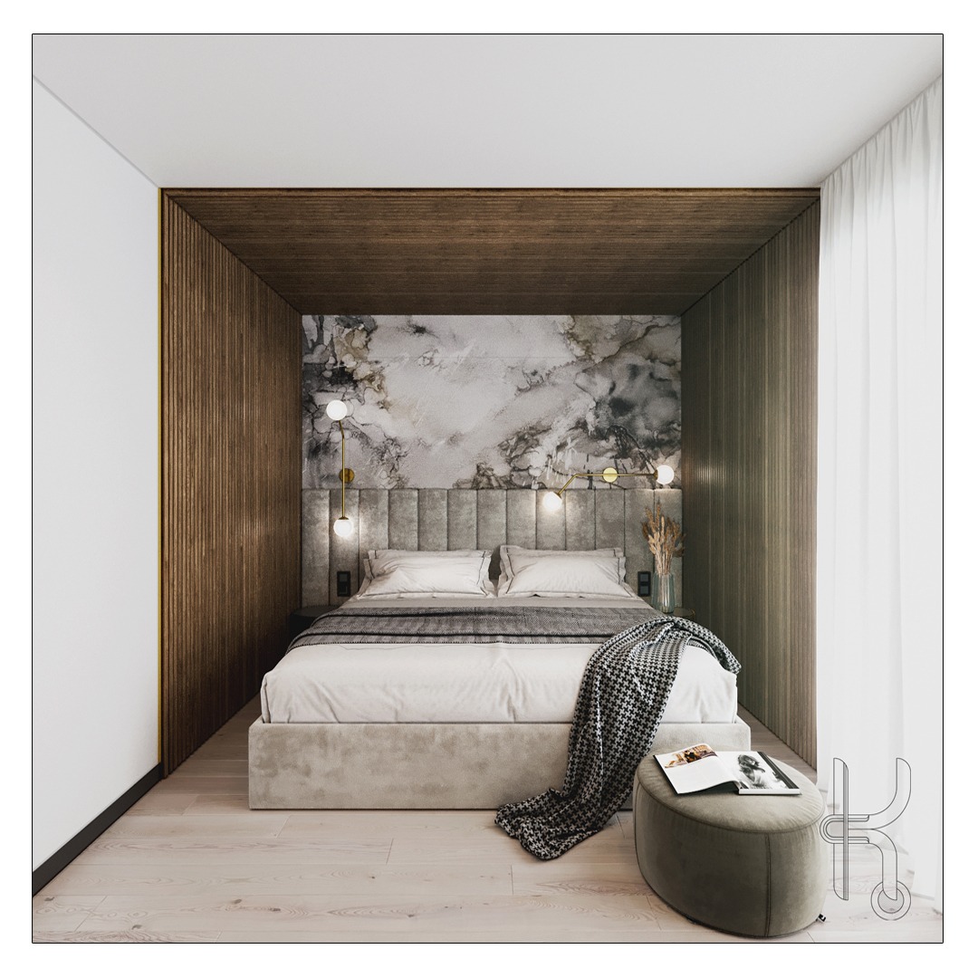 Nowoczesna sypialnia z drewnianą wnęką, tapetą imitującą marmur i pufą z książką