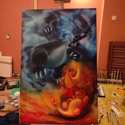 OdKarykatury DoMuralu - twoja wizja, moja pasja - Obraz olejny na płótnie przedstawiający fantastycznego smoka w kontraście ognia i lodu, umieszczony na sztaludze w pracowni artystycznej z widocznymi pędzlami i farbami.