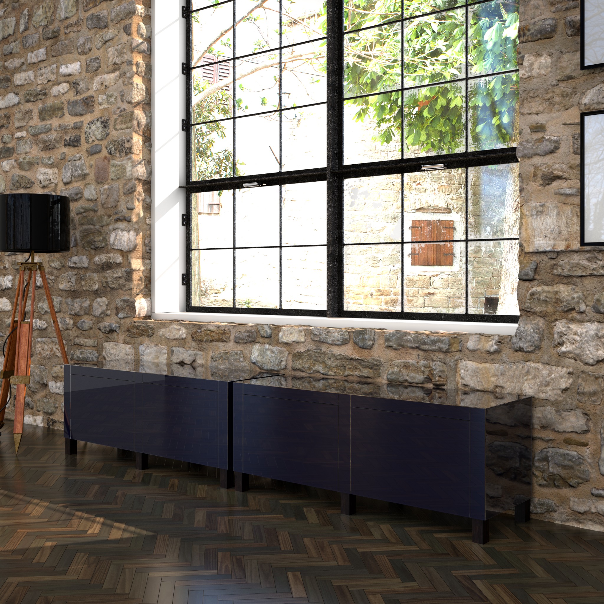 Dwie ciemne, lakierowane szafki na niskich nóżkach stojące pod dużym oknem w pokoju ze ścianą z kamienia i parkietem ułożonym w jodełkę.