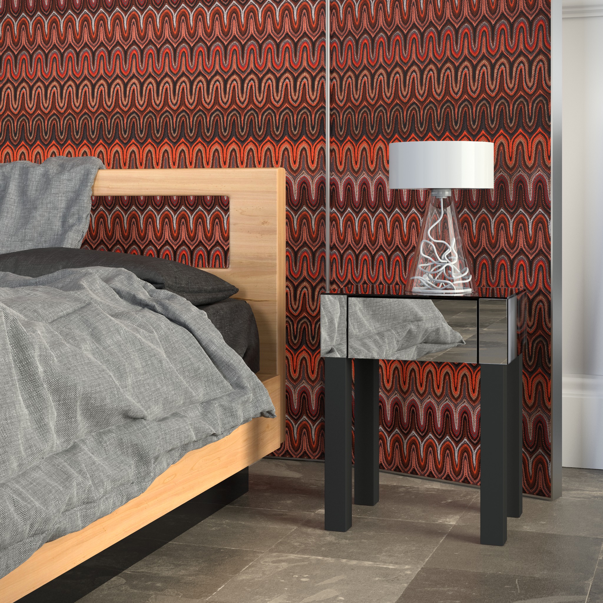 Nowoczesna sypialnia z łóżkiem o drewnianej ramie i stolikiem nocnym z lustrzanymi frontami, na którym stoi lampka z białym abażurem. W tle wzorzysta tapeta w odcieniach czerwieni i brązu.