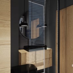 Innova Studio - Wizualizacja łazienki z drewnianą szafką pod umywalką, okrągłym lustrem podświetlonym trzema lampami i grzejnikiem drabinkowym w kolorze czarnym.