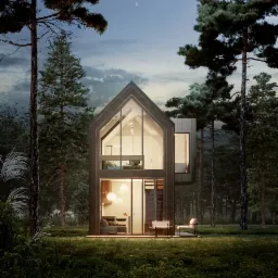 Dwukondygnacyjny, nowoczesny dom z dużymi przeszkleniami, otoczony lasem i łąką o zmierzchu. Widoczne oświetlone wnętrze z meblami i schodami.