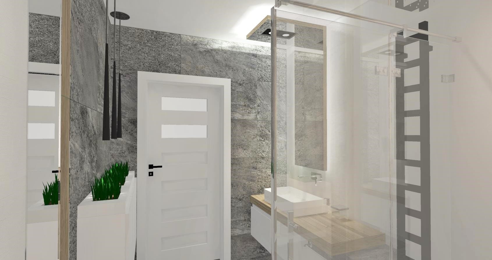 Nowoczesna łazienka z szarą kamienną ścianą, białą umywalką na drewnianym blacie, szklaną kabiną prysznicową z czarnymi elementami dekoracyjnymi i roślinami w białych donicach.
