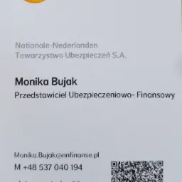 Wizytówka przedstawiciela ubezpieczeniowo-finansowego Monika Bujak z Nationale-Nederlanden, zawierająca logo firmy, dane kontaktowe i adres. Widoczny kod QR.