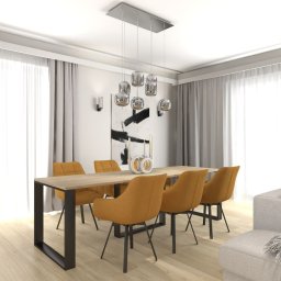 Flare Design Agata Mucha - Stylowa aranżacja jadalni w Lublinie: drewniany stół z czarnymi nogami, musztardowe krzesła, designerska lampa i abstrakcyjny obraz na ścianie. Jasne wnętrze z zasłonami.