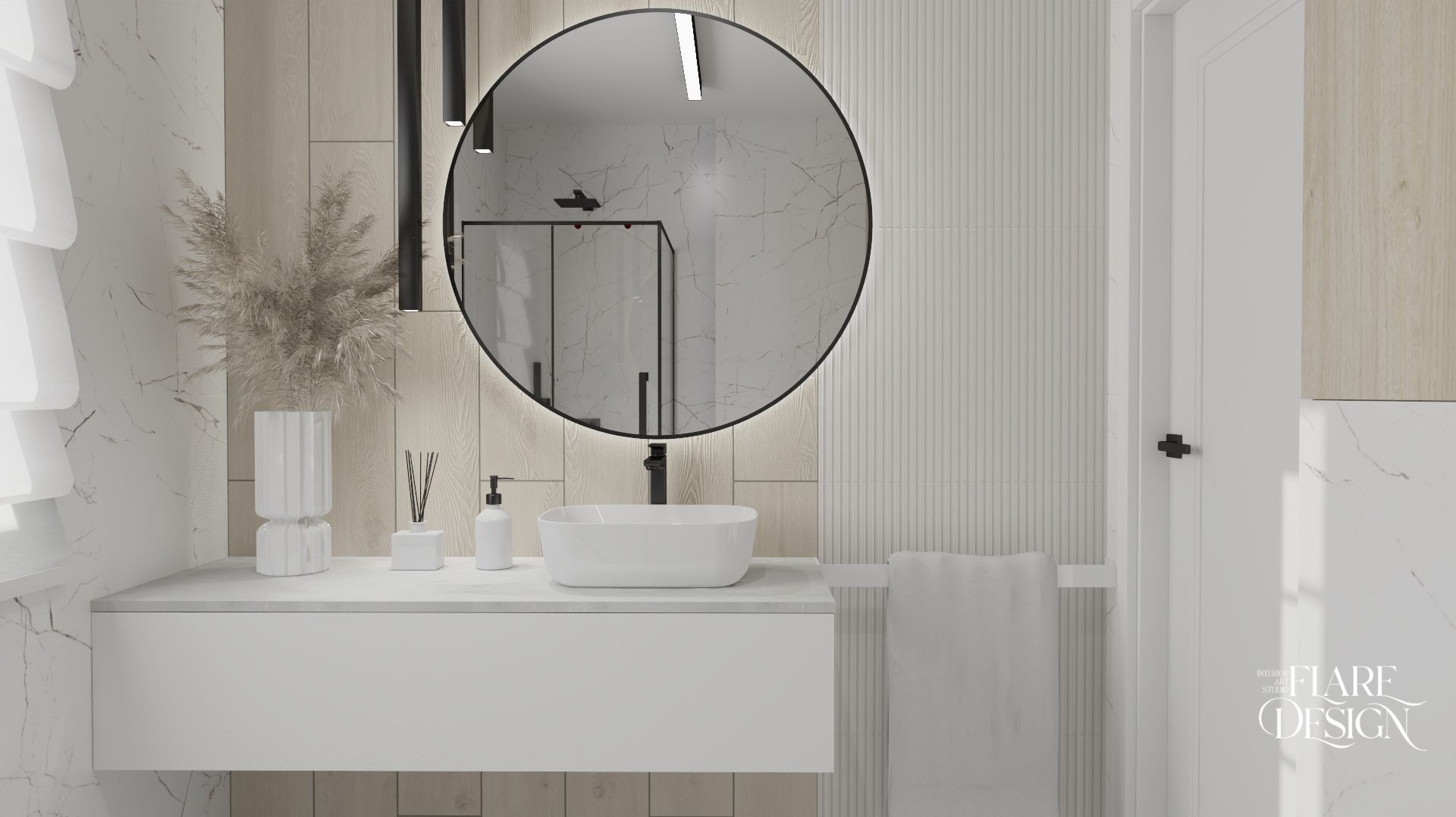 Minimalistyczna łazienka z okrągłym lustrem podświetlanym LED, białą umywalką nablatową, czarną armaturą i dekoracyjnym wazonem z suszonymi trawami na blacie z szufladą.