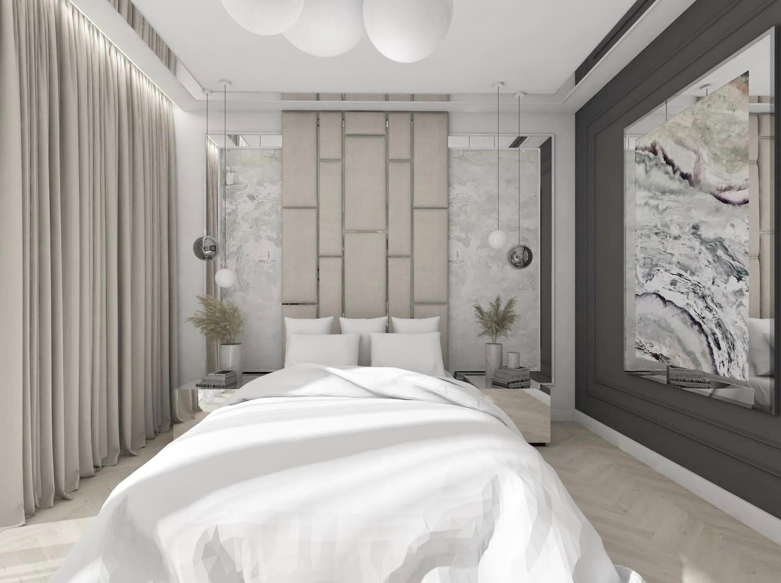Nowoczesna sypialnia z łóżkiem w białej pościeli, tapicerowanym wezgłowiem w geometryczne panele i lustrzanymi ścianami bocznymi, uzupełniona wiszącymi lampami kulami i abstrakcyjnym obrazem...