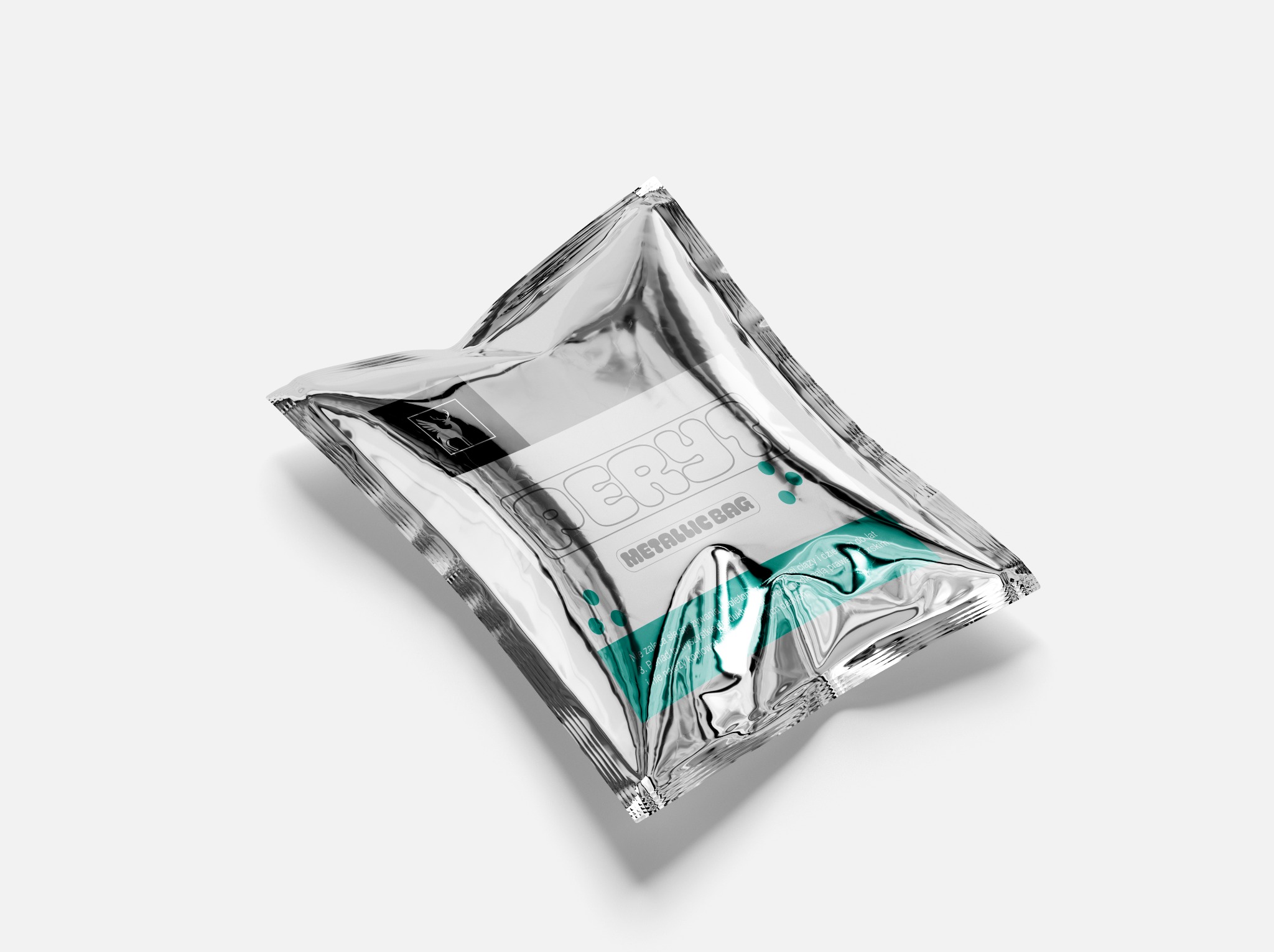 Srebrna, metaliczna torebka foliowa z nadrukiem nazwy produktu i zielonymi akcentami graficznymi, leżąca ukośnie na białym tle z widocznym cieniem.