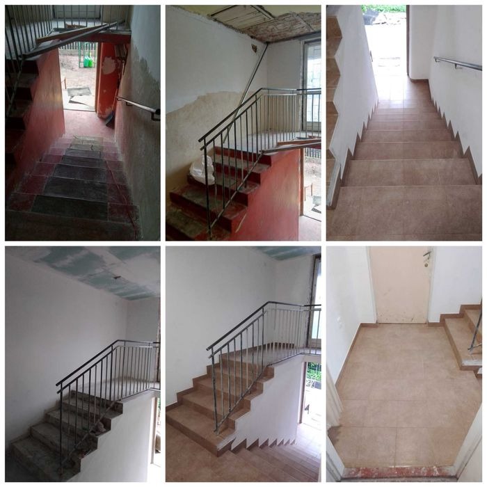 Klatka schodowa w bloku mieszkalnym w trakcie remontu, widoczne różne etapy prac: od surowych ścian i schodów po położone płytki i pomalowane ściany, metalowe barierki.