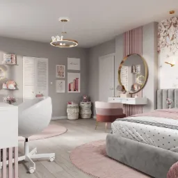 Jasna sypialnia dla dziecka z szarymi ścianami, łóżkiem z szarym wezgłowiem, toaletką z okrągłym lustrem w złotej ramie, biurkiem z białym krzesłem obrotowym, okrągłymi dywanami w odcieniach różu...