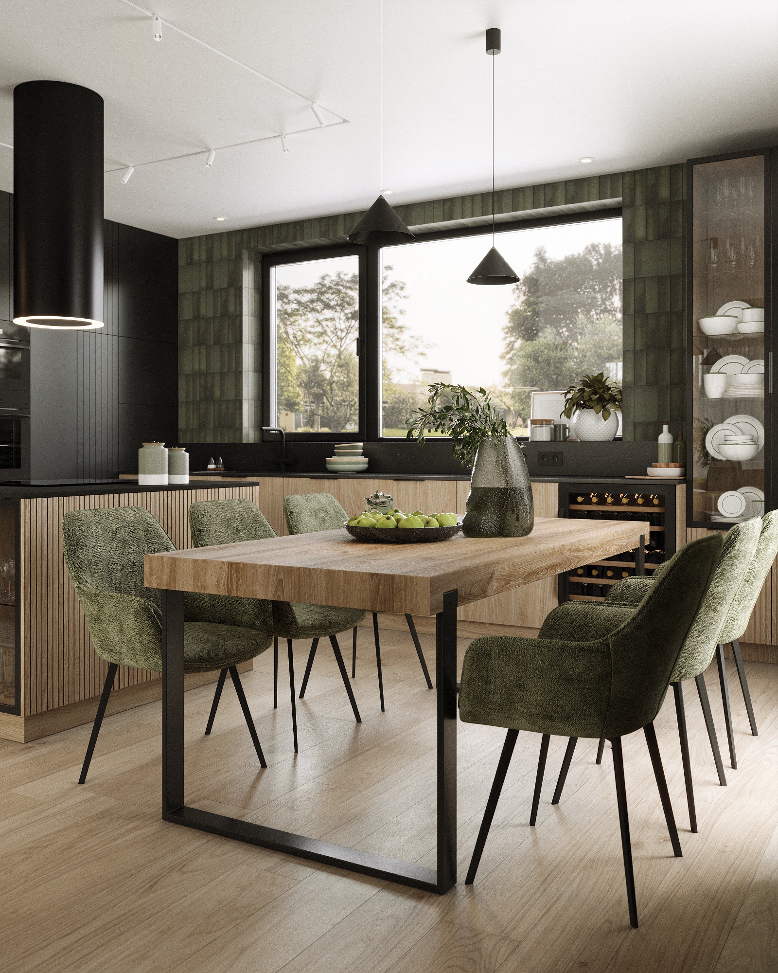 Nowoczesna jadalnia z drewnianym stołem na metalowych nogach, otoczona krzesłami w zielonej tapicerce, na blacie misa z zielonymi jabłkami i wazon z gałązkami na tle zielonej ściany w płytkach...