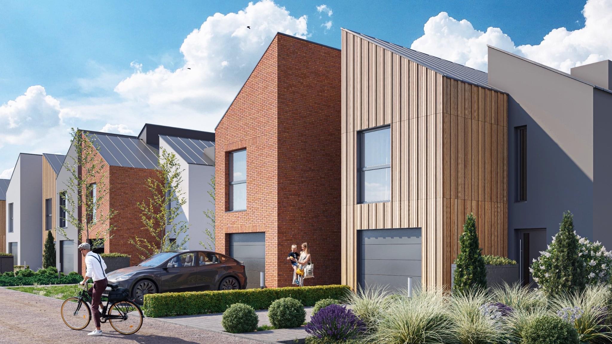 Wizualizacja szeregu nowoczesnych domów jednorodzinnych z garażami, elewacje z cegły, drewna i szarego tynku, przed domami zadbana zieleń, rodzina przed jednym z domów, mężczyzna na rowerze.